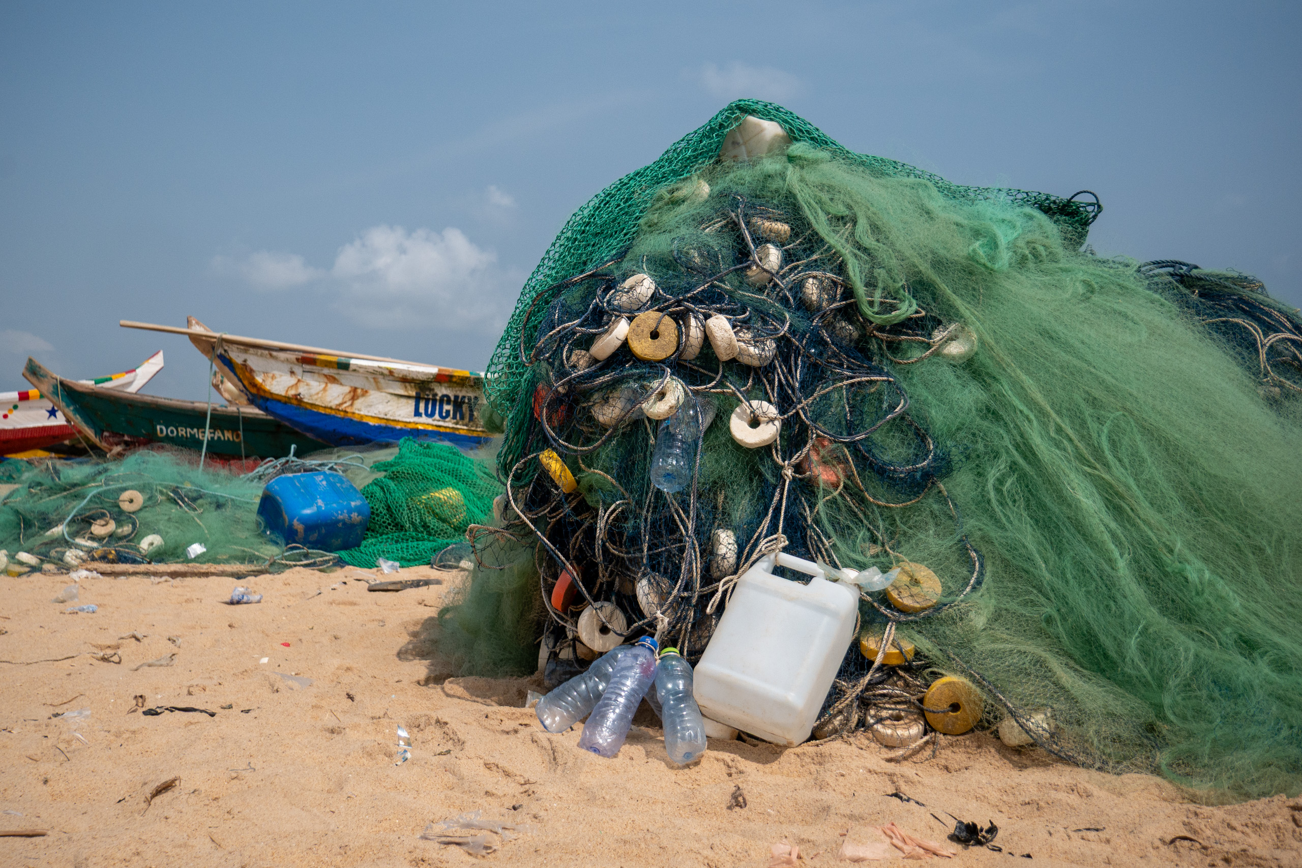 large pile of nets on beach