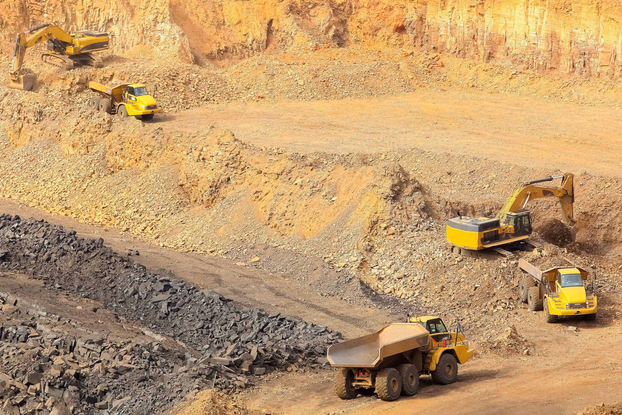heavy vehicles digging and loading