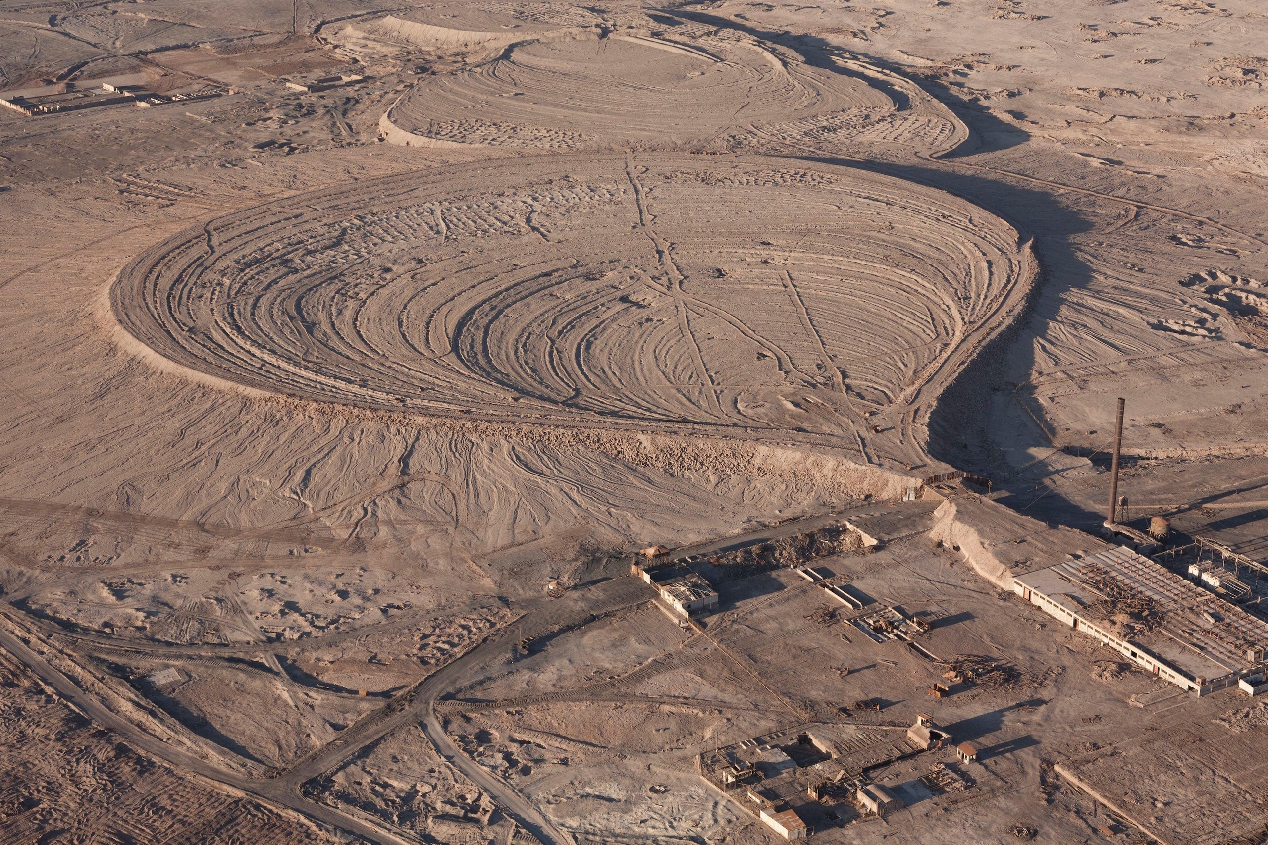 an aerial view of mine tailings dump