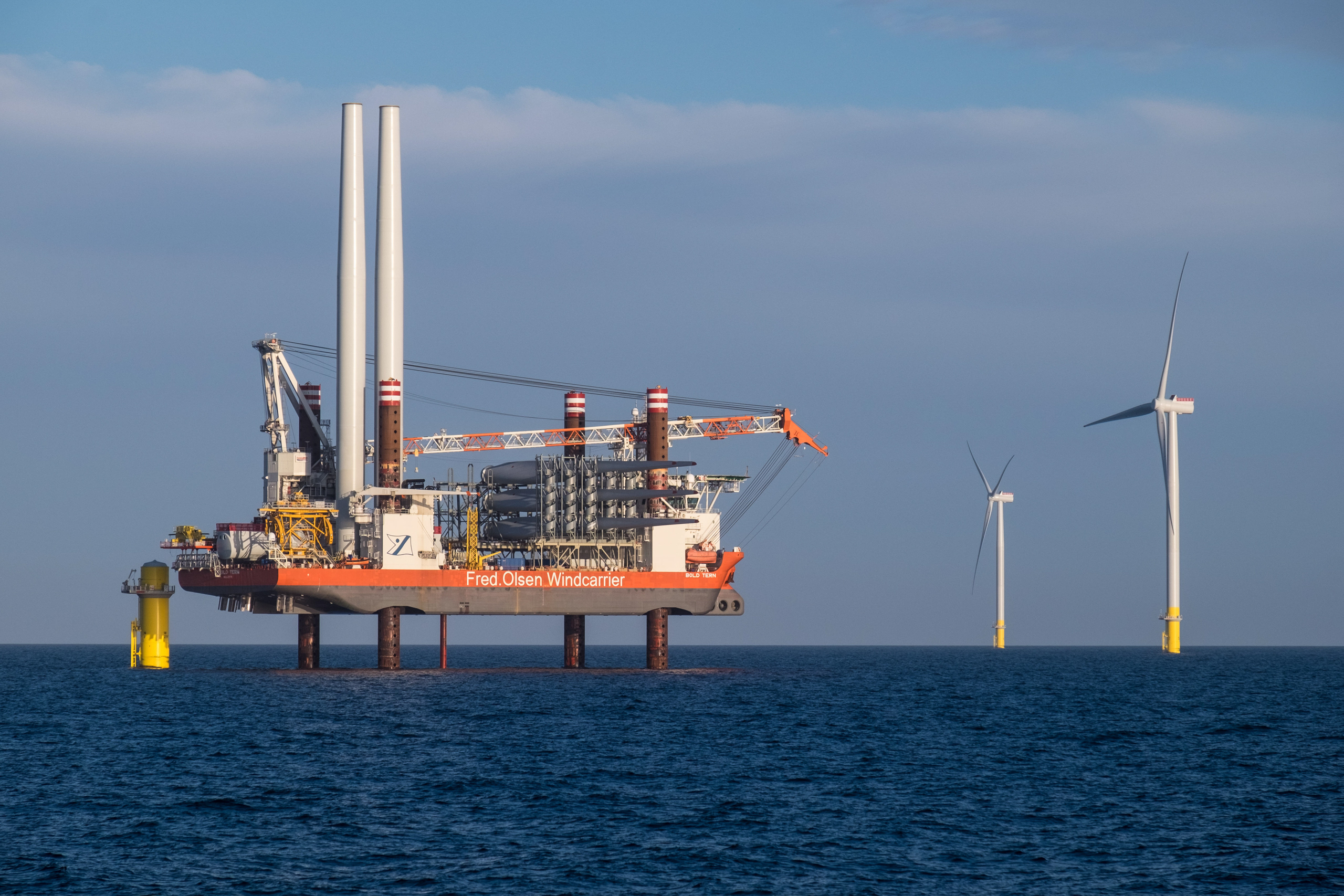 <p>Turbines being added to the United Kingdom’s Hornsea wind farm in the North Sea during 2019. A world leader in producing this type of renewable energy, the country has begun assisting India in achieving its own offshore wind goals (Image: Rob Arnold / Alamy)</p>