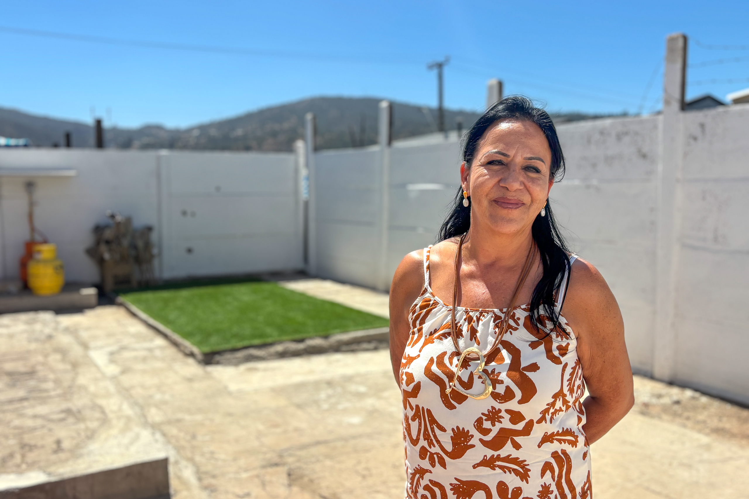 woman standing in open courtyard