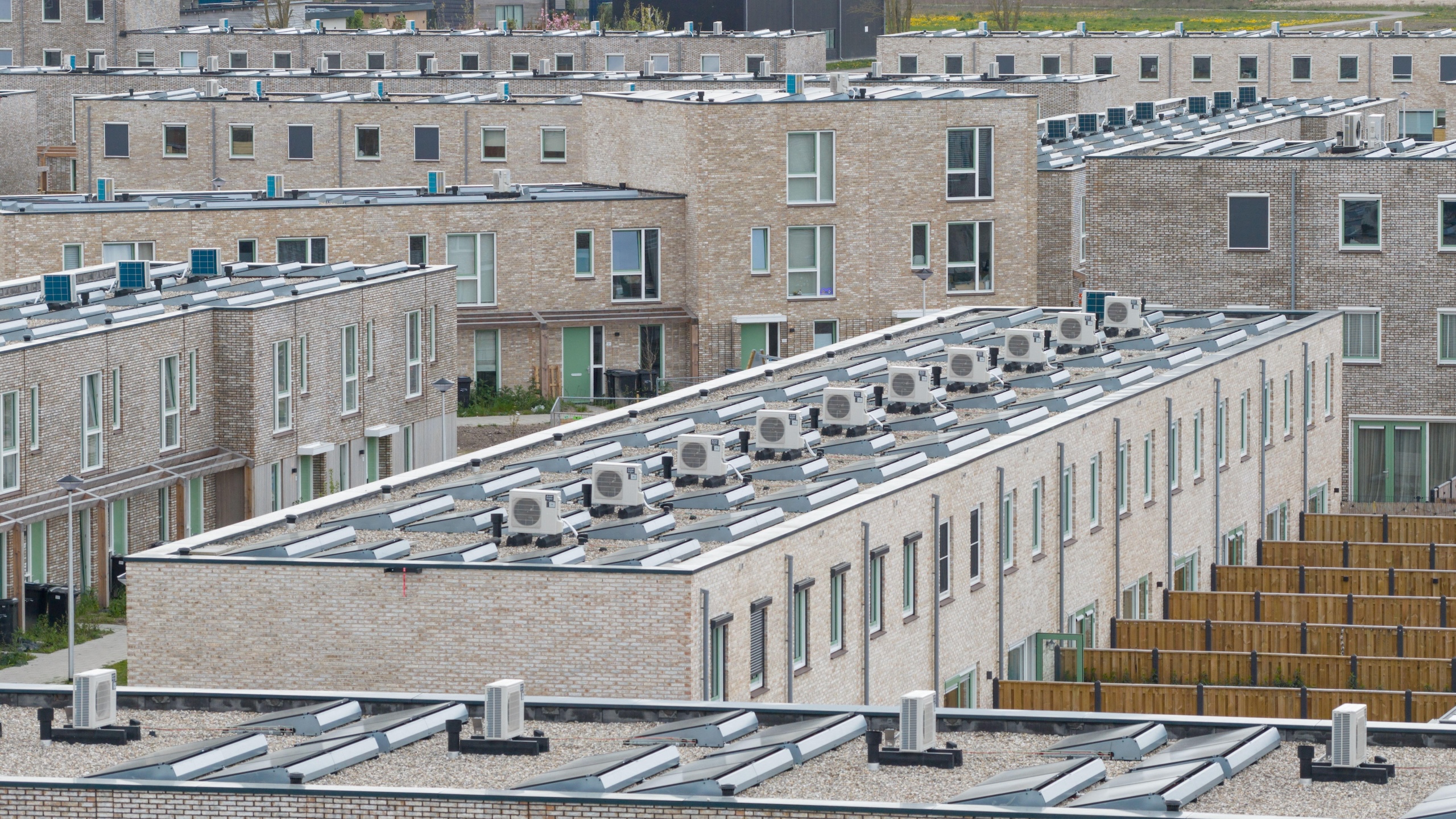 Aerial view of heat pumps on residential housing