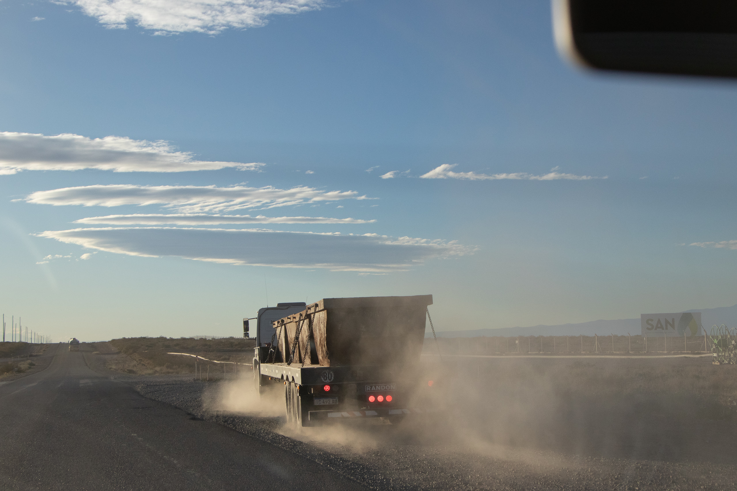 dust trailing from truck