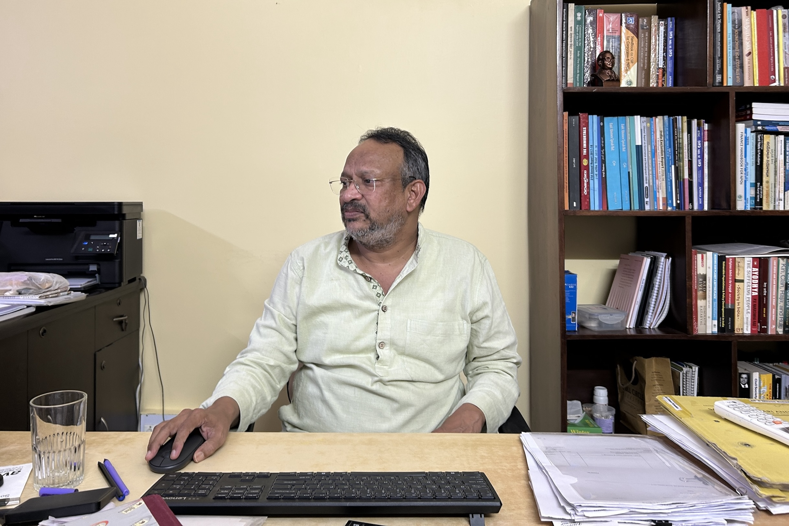 man seated at desk