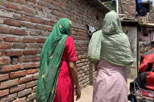women walking in alley
