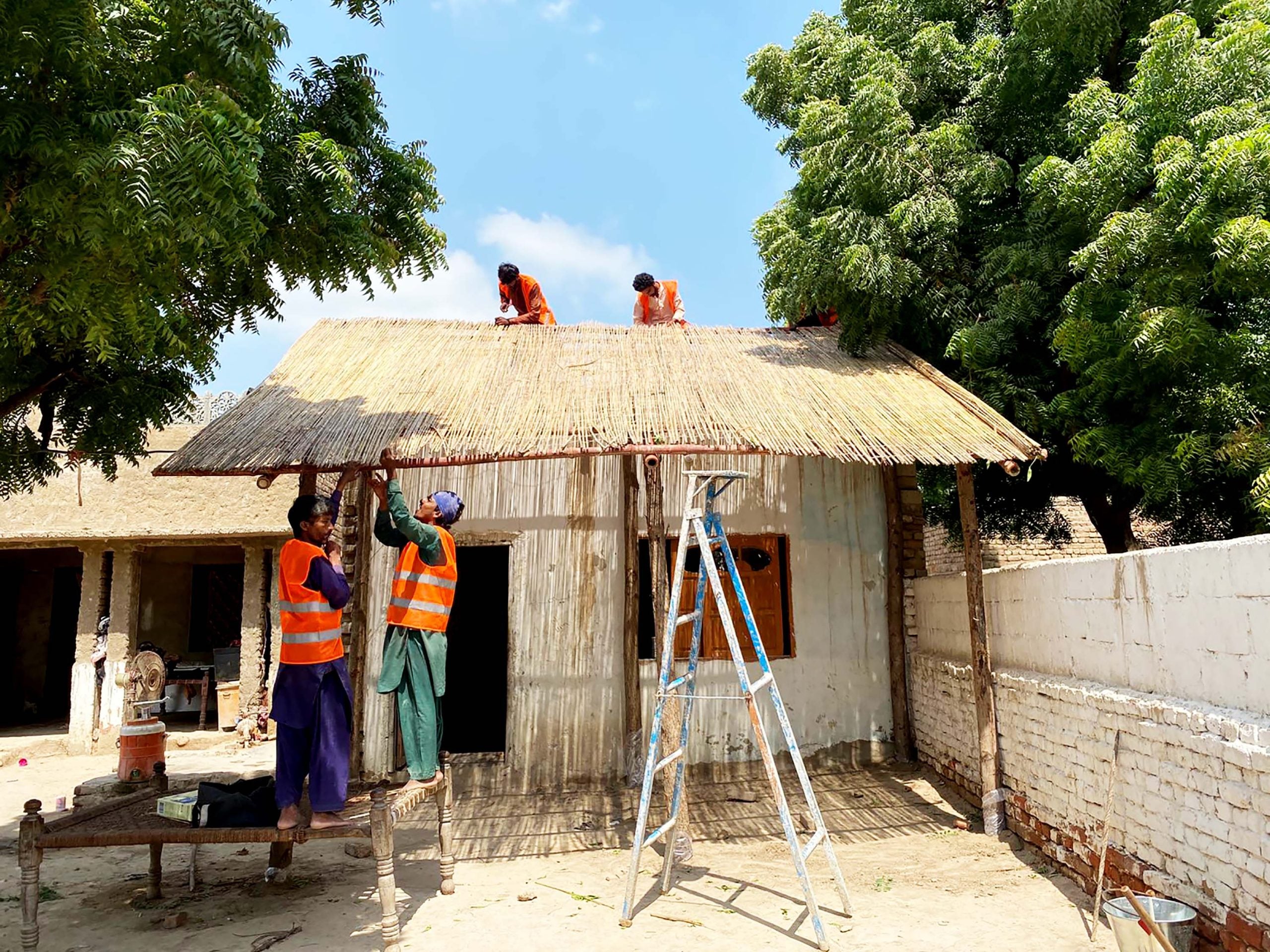 People install verandah shading to a house