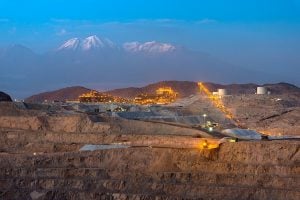 A panoramic view of a mining site at dusk
