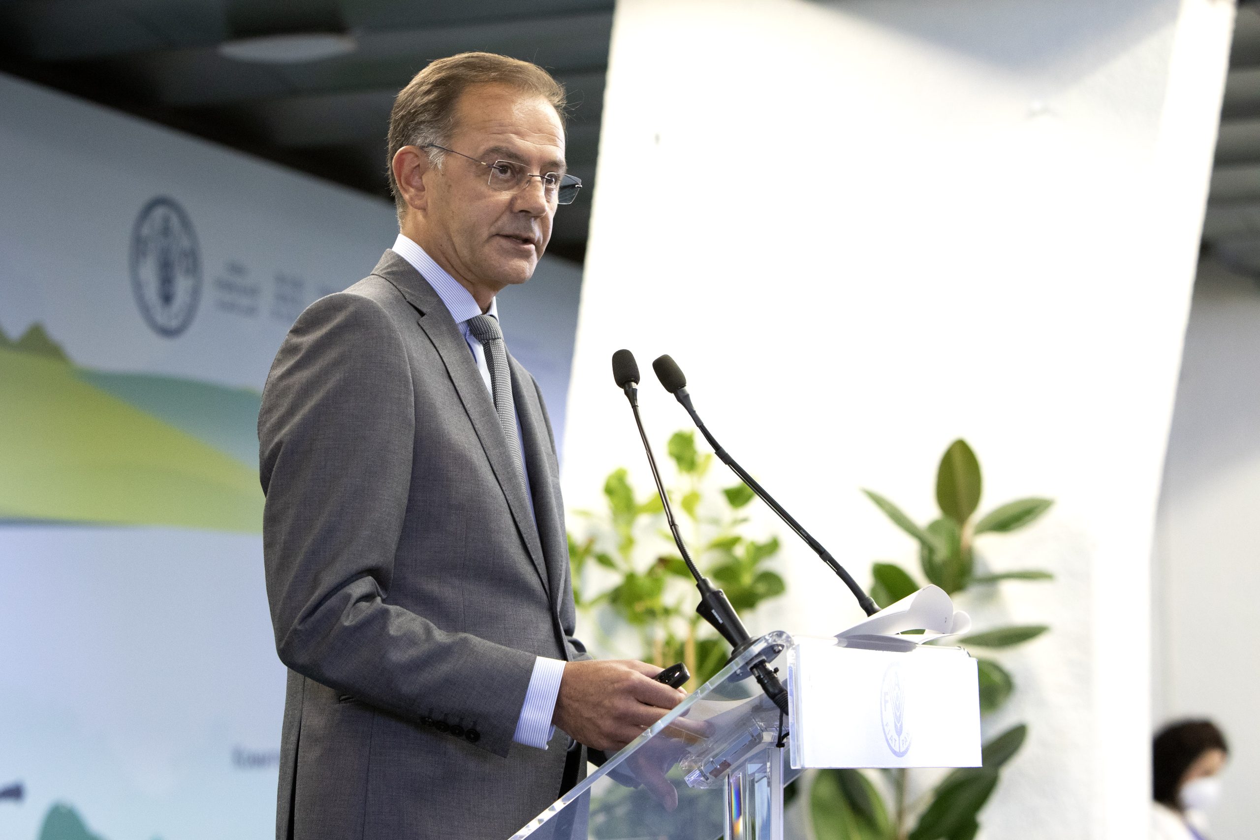 man speaking into microphone