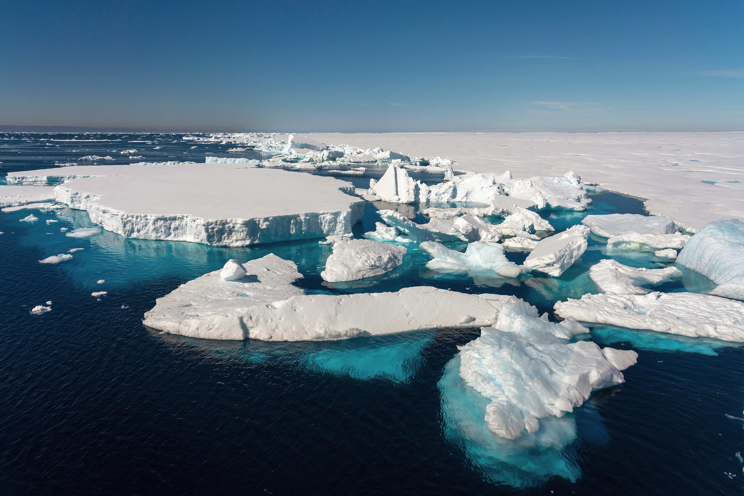blocks of ice in a body of water
