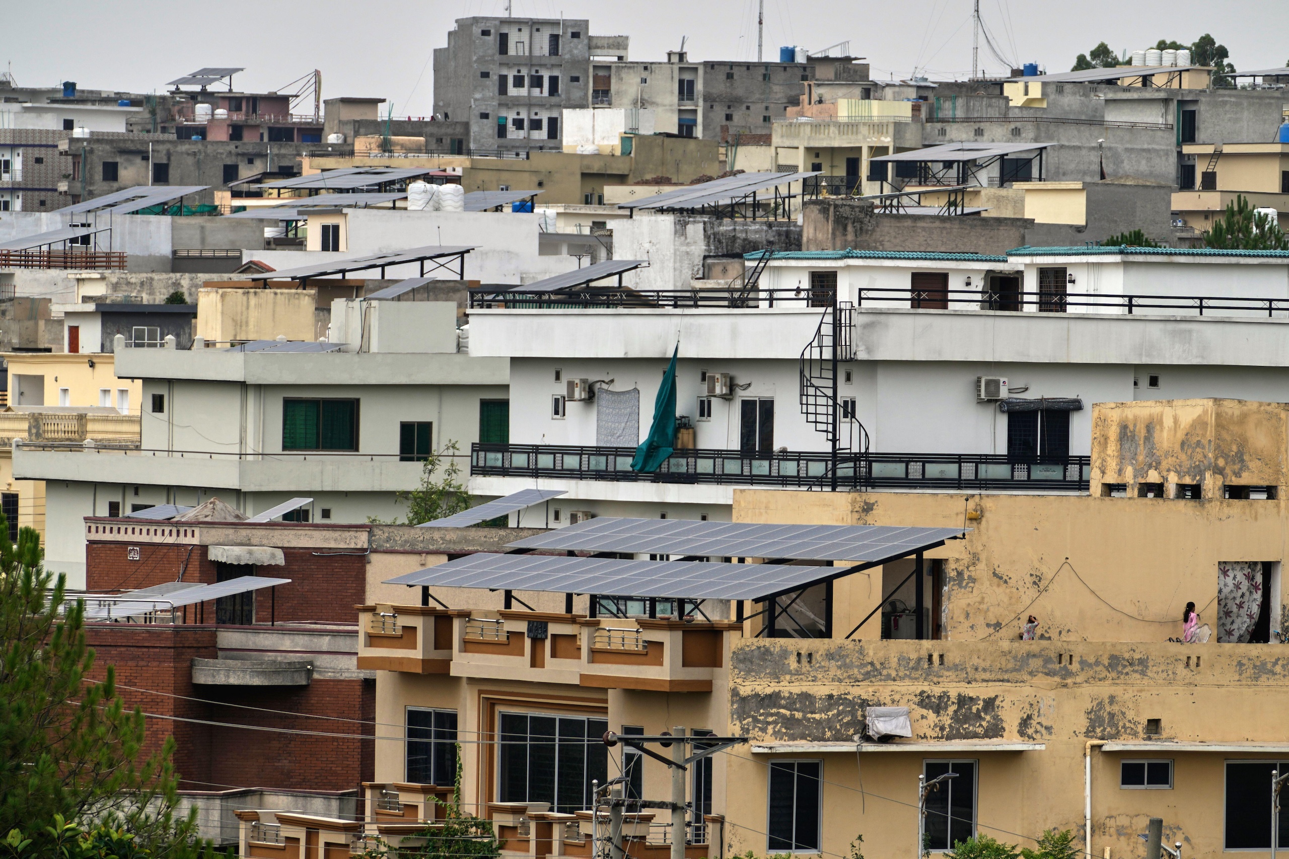 Various multi-story buildings with rooftop solar panels