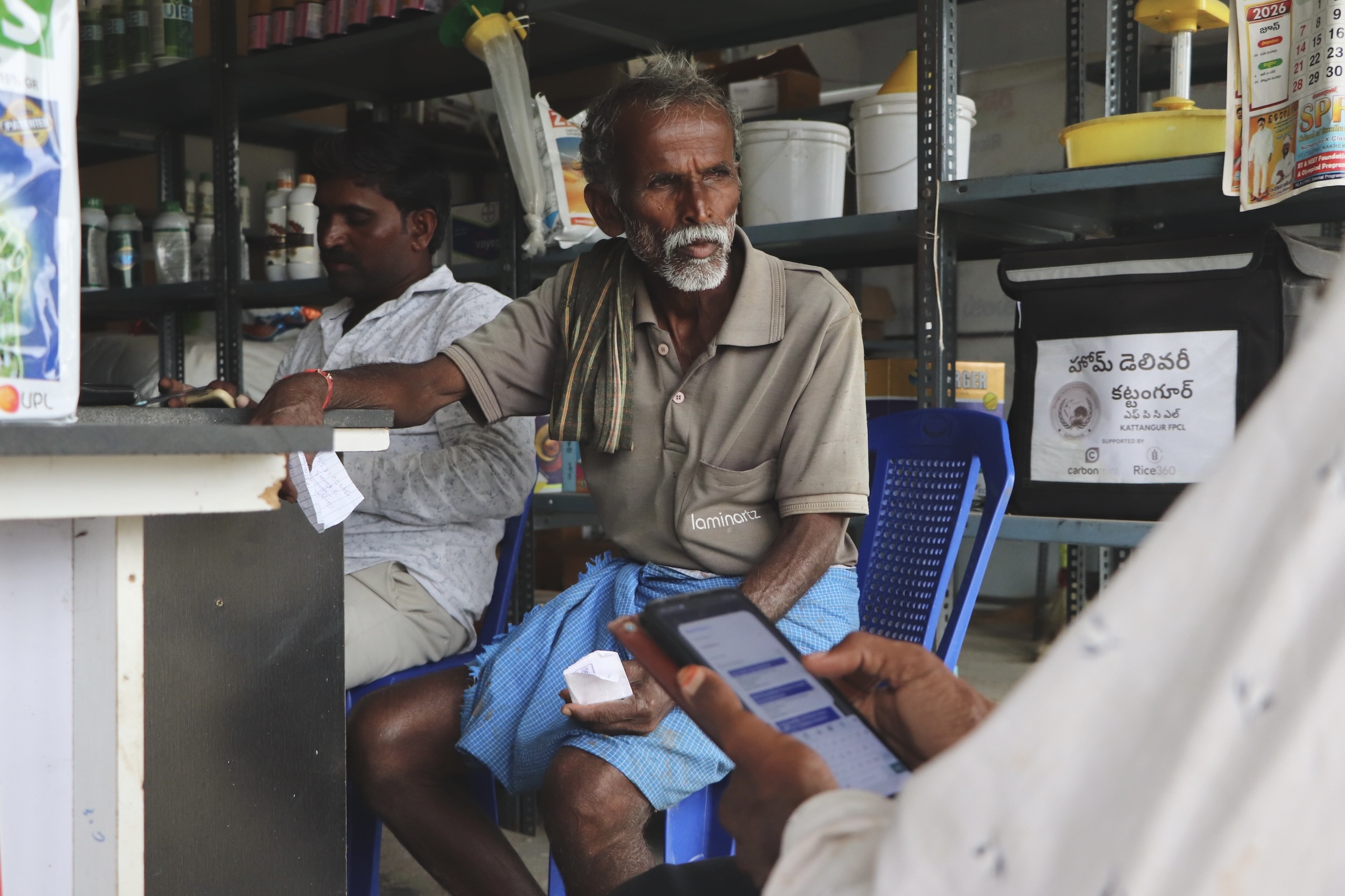 men seated at counter