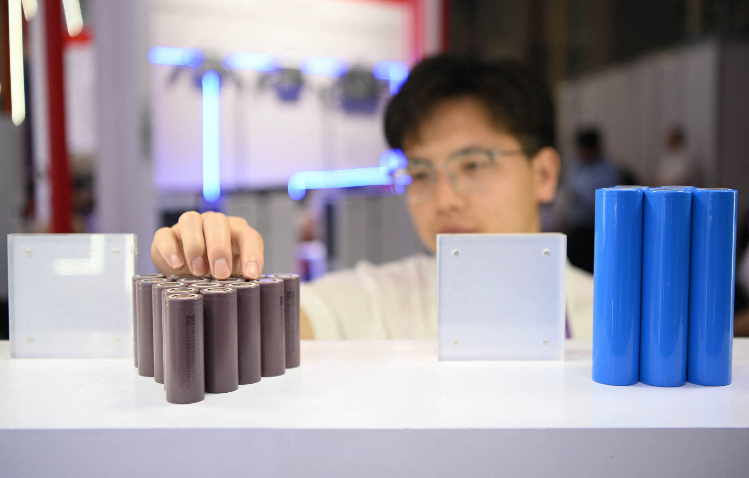 <p>Lithium batteries on display at a fair in Guangzhou, south China (Image: Xinhua / Alamy)</p>