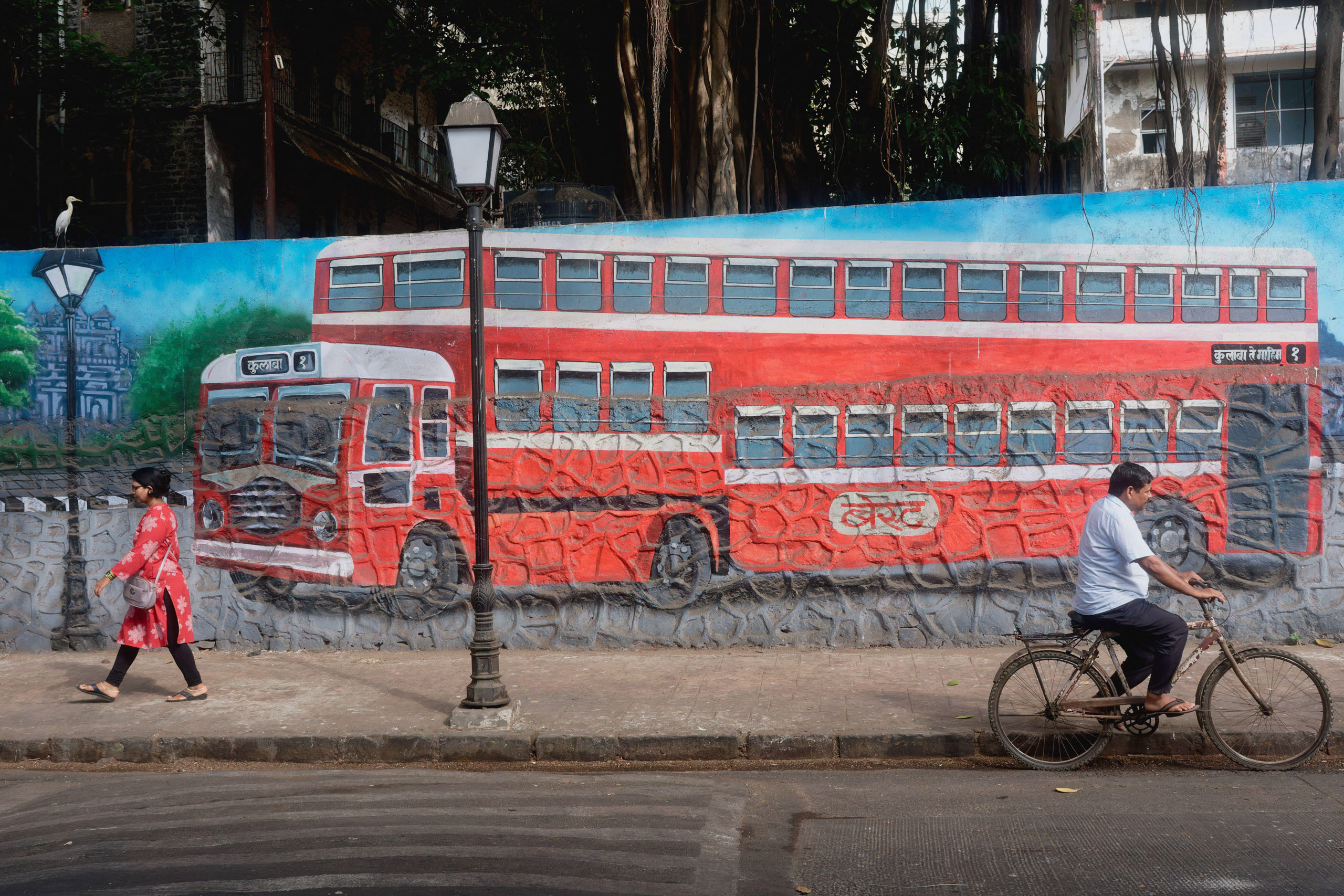 red bus mural on wall