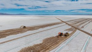 Mining trucks on salt flat