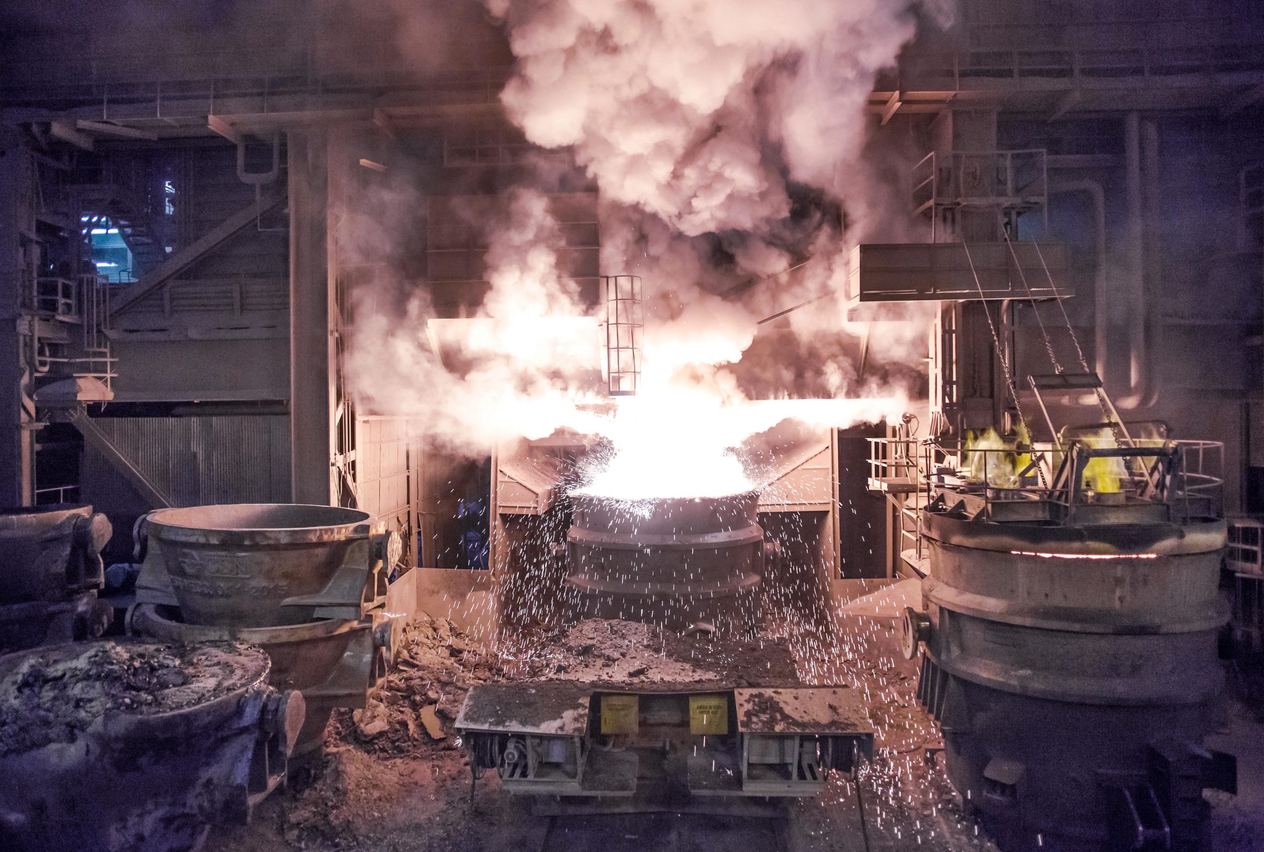 sparks and smoke in blast furnace