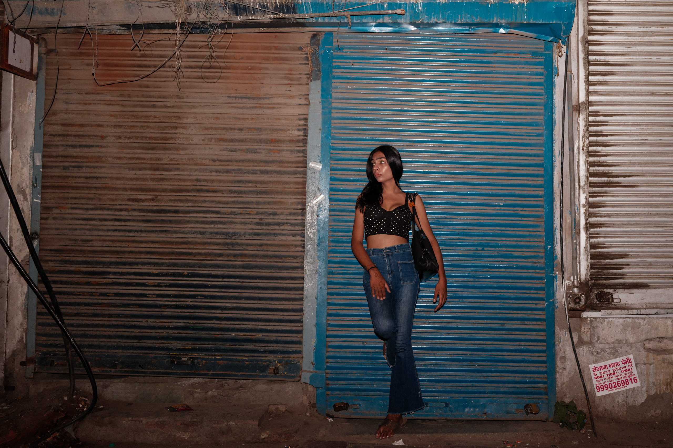 <p>Trans sex worker Leena* waits for clients at a cruising spot (Image: <a href="https://www.instagram.com/gorkeypatwal">Gorkey Patwal</a>)</p>