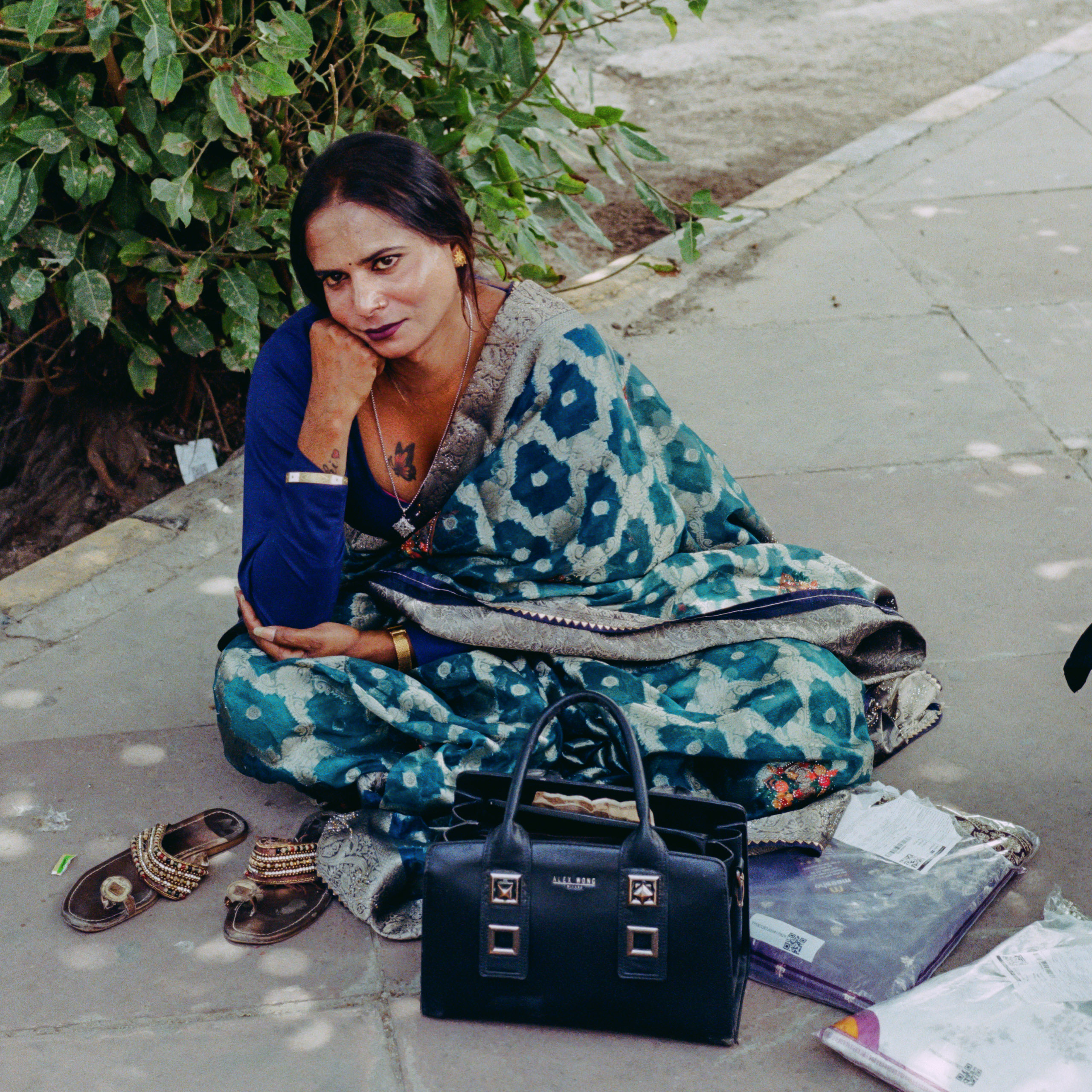 woman sitting on ground