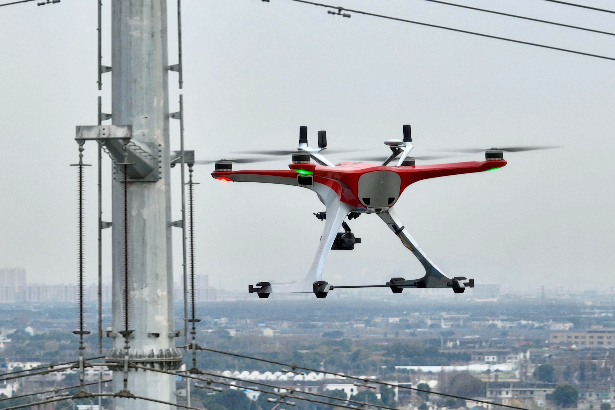 <p>An unmanned drone deployed to inspect transmission lines in Nanjing, east China. Such technology is also increasingly being used in Southeast Asia (Image: State Grid Jiangsu Electric Power Co., Ltd. / Xinhua / Alamy)</p>