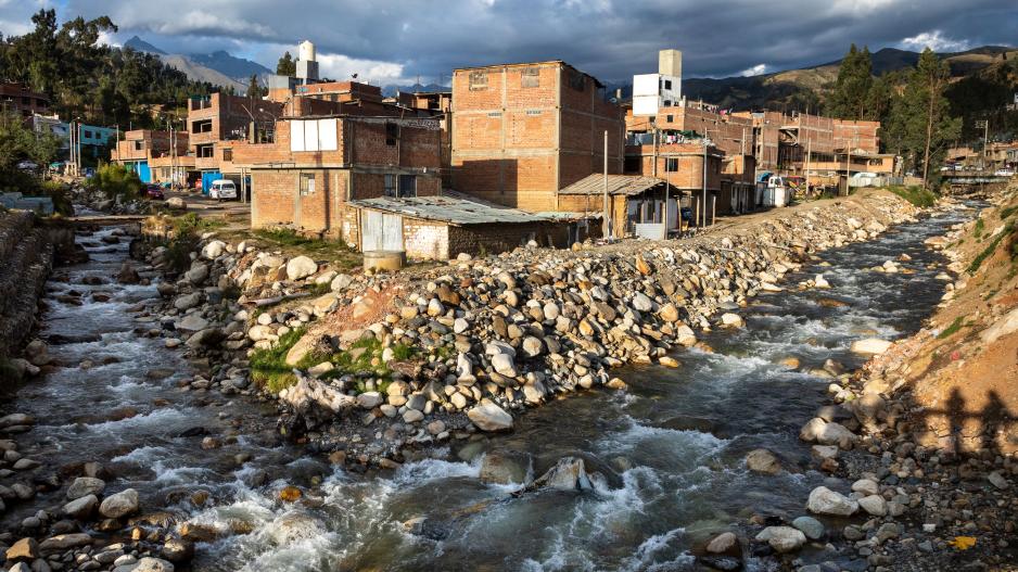 confluence of two rivers near buildings