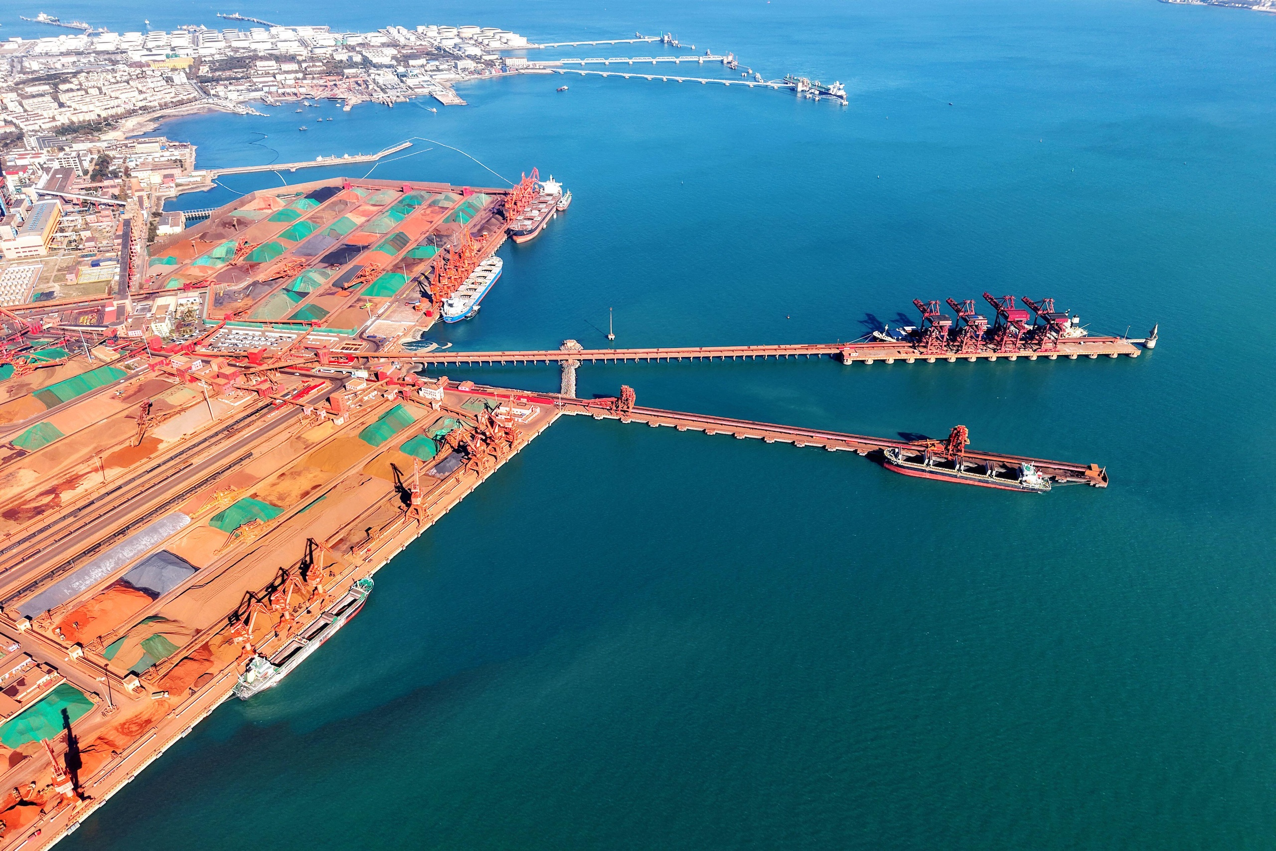 <p>Imported iron ore is unloaded at the port of Qingdao, Shandong province. As the source of around 60% of China’s iron ore supply, Australia and its miners could be exposed to changes in demand from China’s steel sector (Image: Cynthia Lee / Alamy)</p>