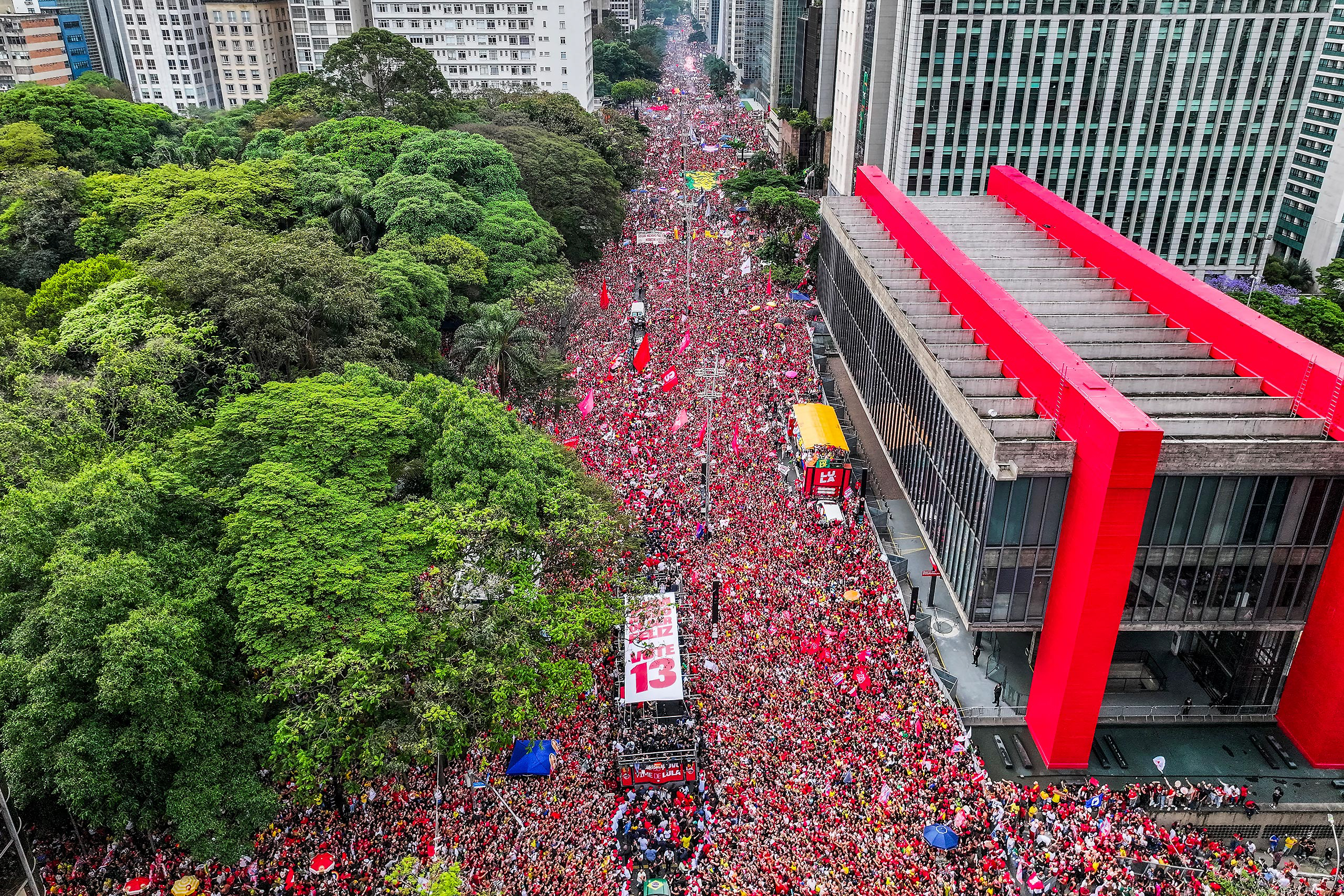 aerial view of large crowd wearing red