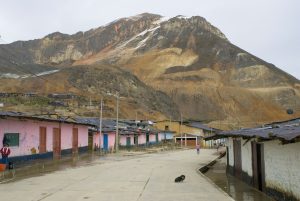 buildings and street beneath mountain