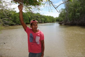 Schoolteacher Jorge Lopez, shown on the banks of the Brito River, opposes the Nicaragua canal project (photo credit: Chris Kraul).