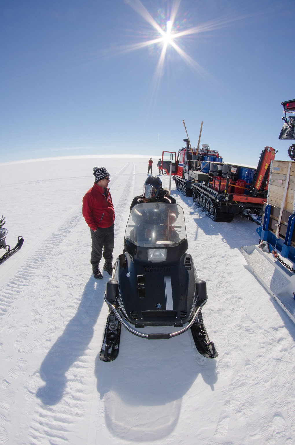 Vikram being briefed before going out for work [image by Peter Leopold / Norwegian Polar Institute]