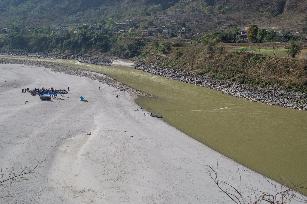 The Trishuli has turned from clear blue to muddy brown [image by Nabin Baral]